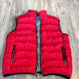 Red Puffer Vest with Zipper Pockets and black and white gingham interior